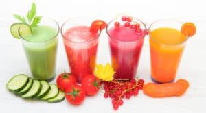 how to juice at home with 4 glasses of different colored juices