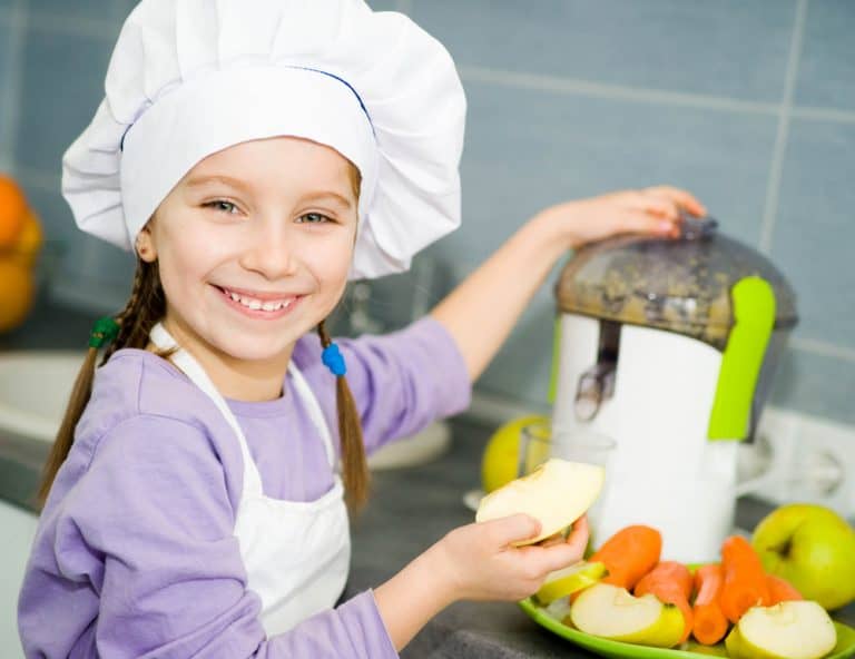 Child making fresh juice