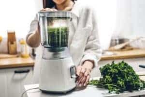 making leafy green vegetable juice