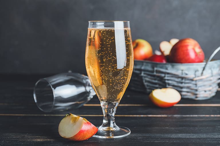fizzy apple juice in glass