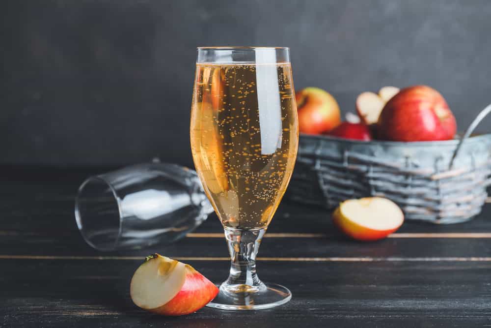 fizzy apple juice in glass